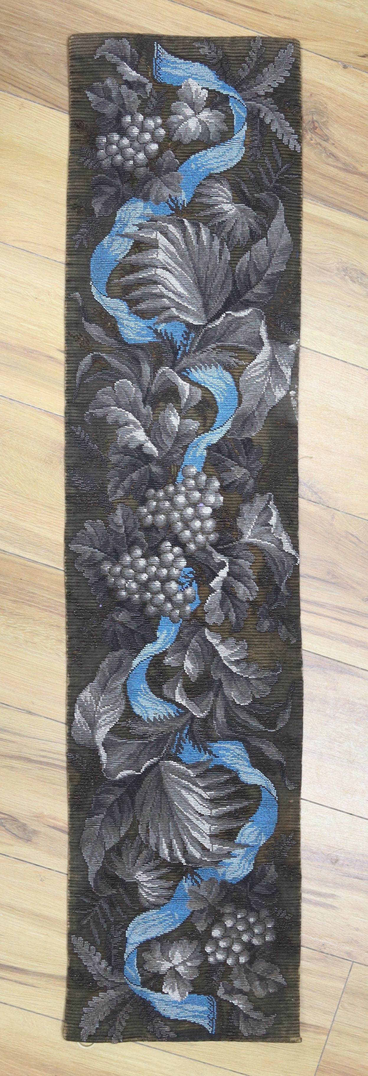 A 19th century Berlin beadwork bell pull, 112x26cm